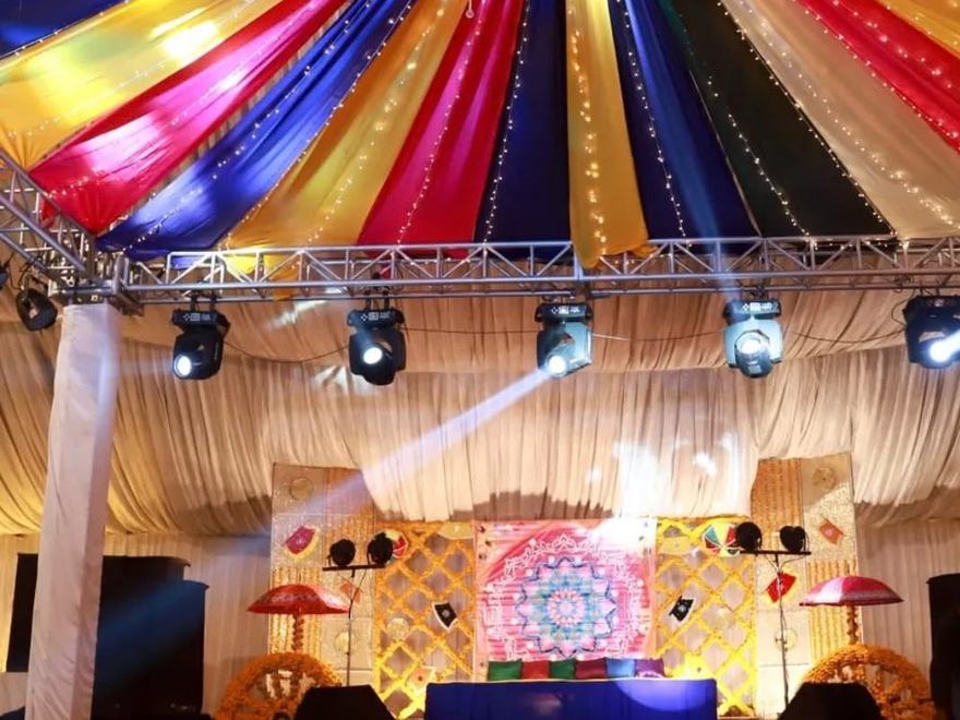 Mehndi seating and stage with mirrored backdrop