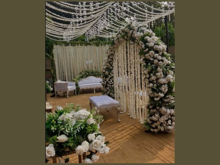 Nikkah setup in white roses and hanging jasmine by Wedding Alley